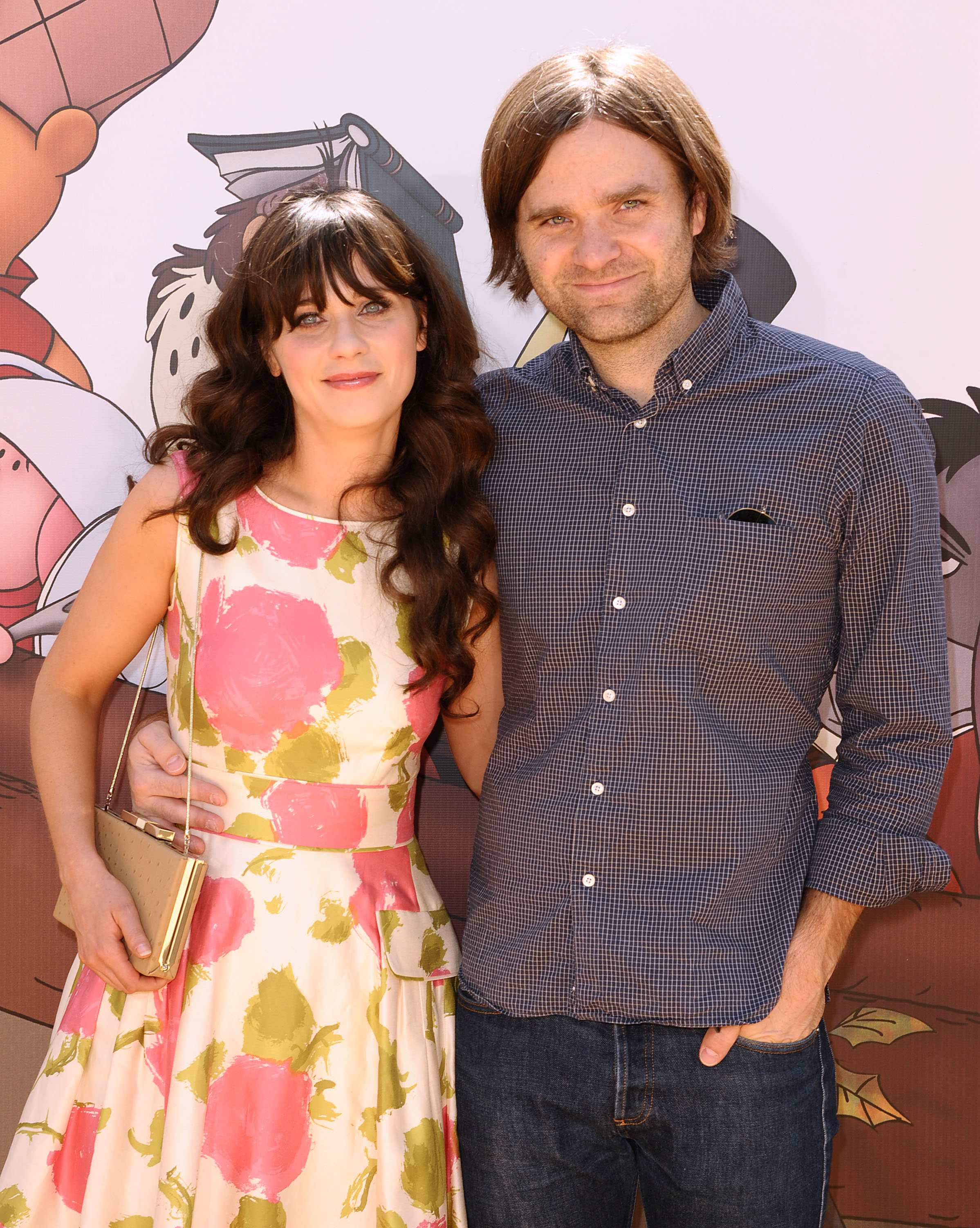 Zooey Deschanel and Ben Gibbard at the premiere of Winnie the Pooh
