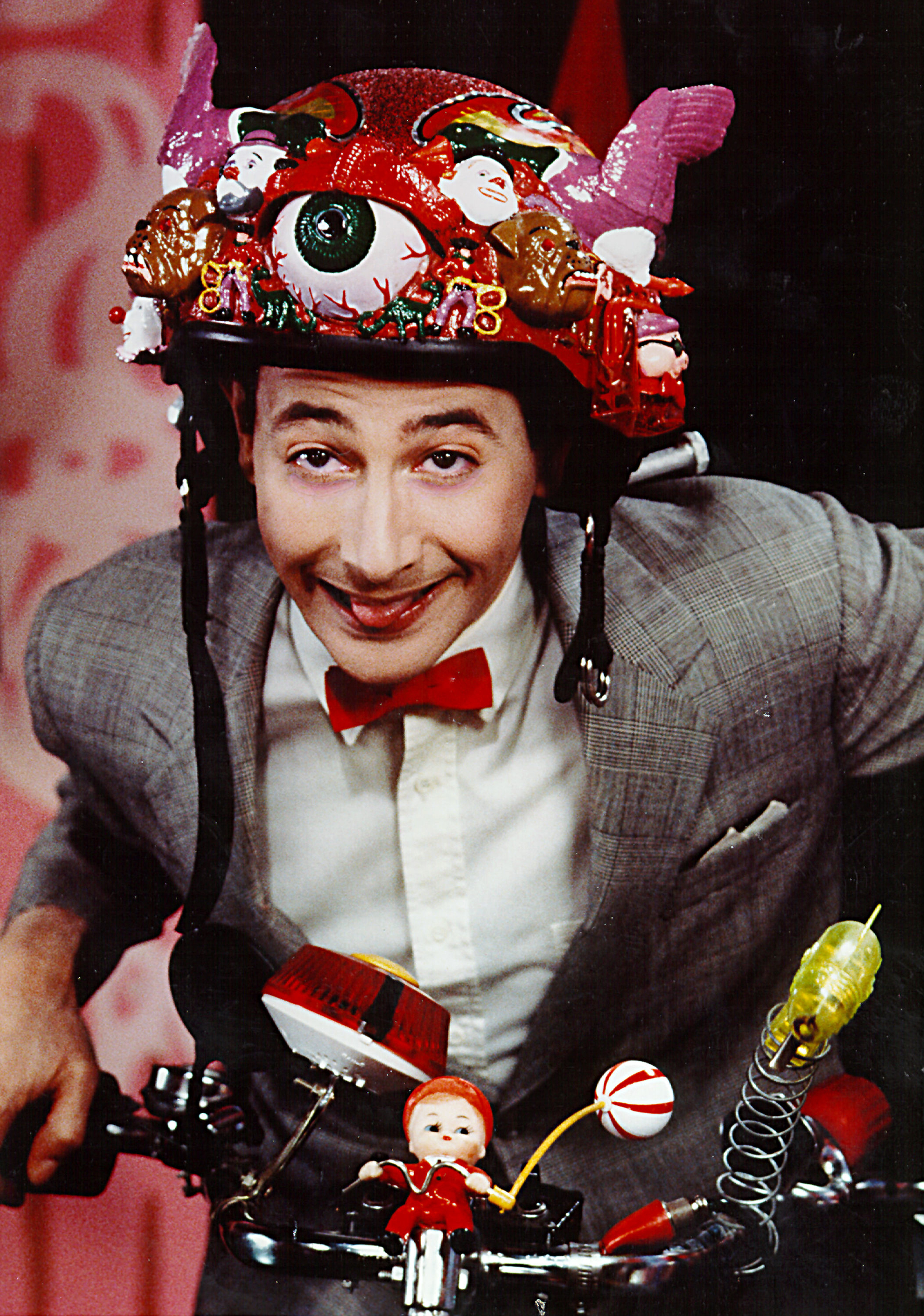 Closeup of Pee-wee Herman on his bicycle