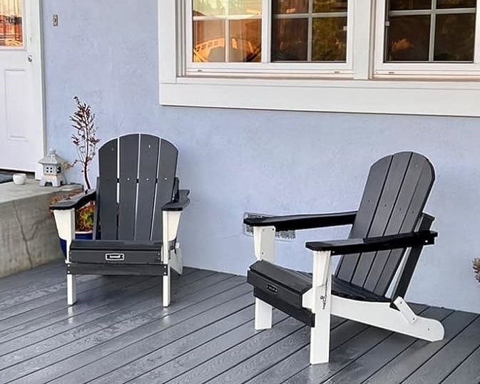 Reviewer image of two black and white chairs in front of their home