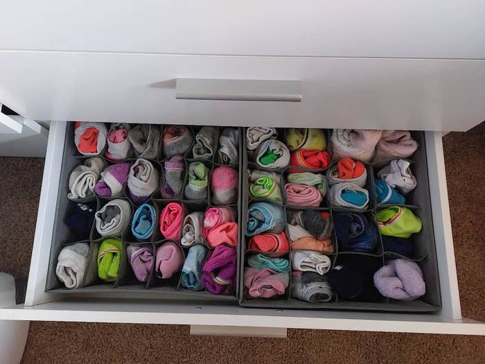 Reviewer image of the two organizers used for socks
