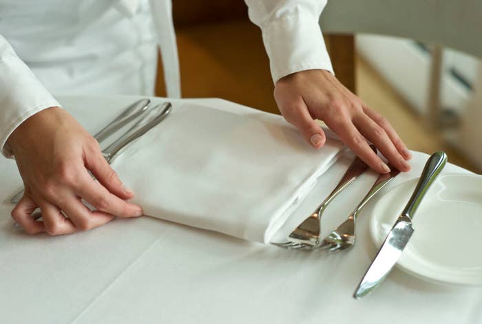 person setting a table