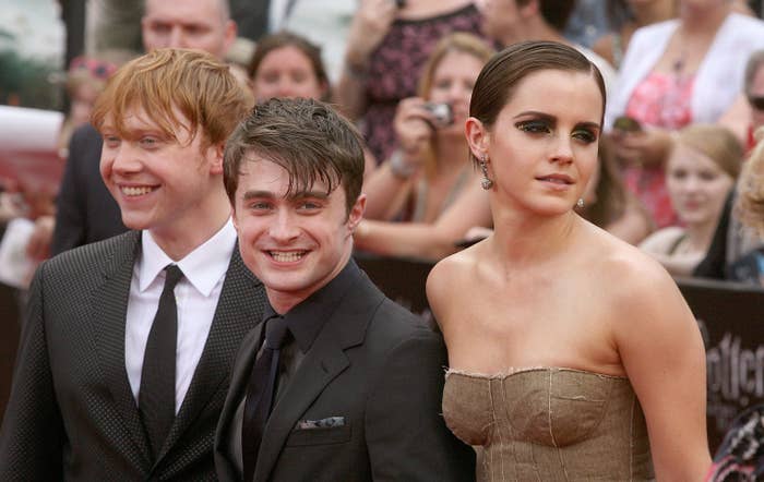 daniel, emma watson, and rupert grint at a Harry Potter movie premiere
