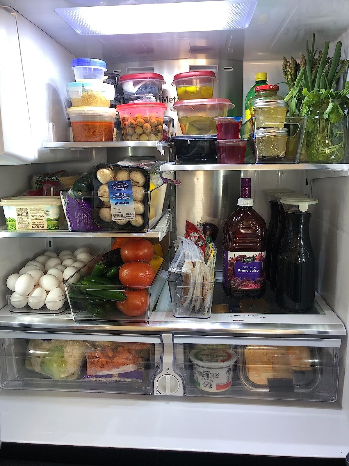 Reviewer's fridge with clear bins separating eggs from produce from meats from condiments etc.