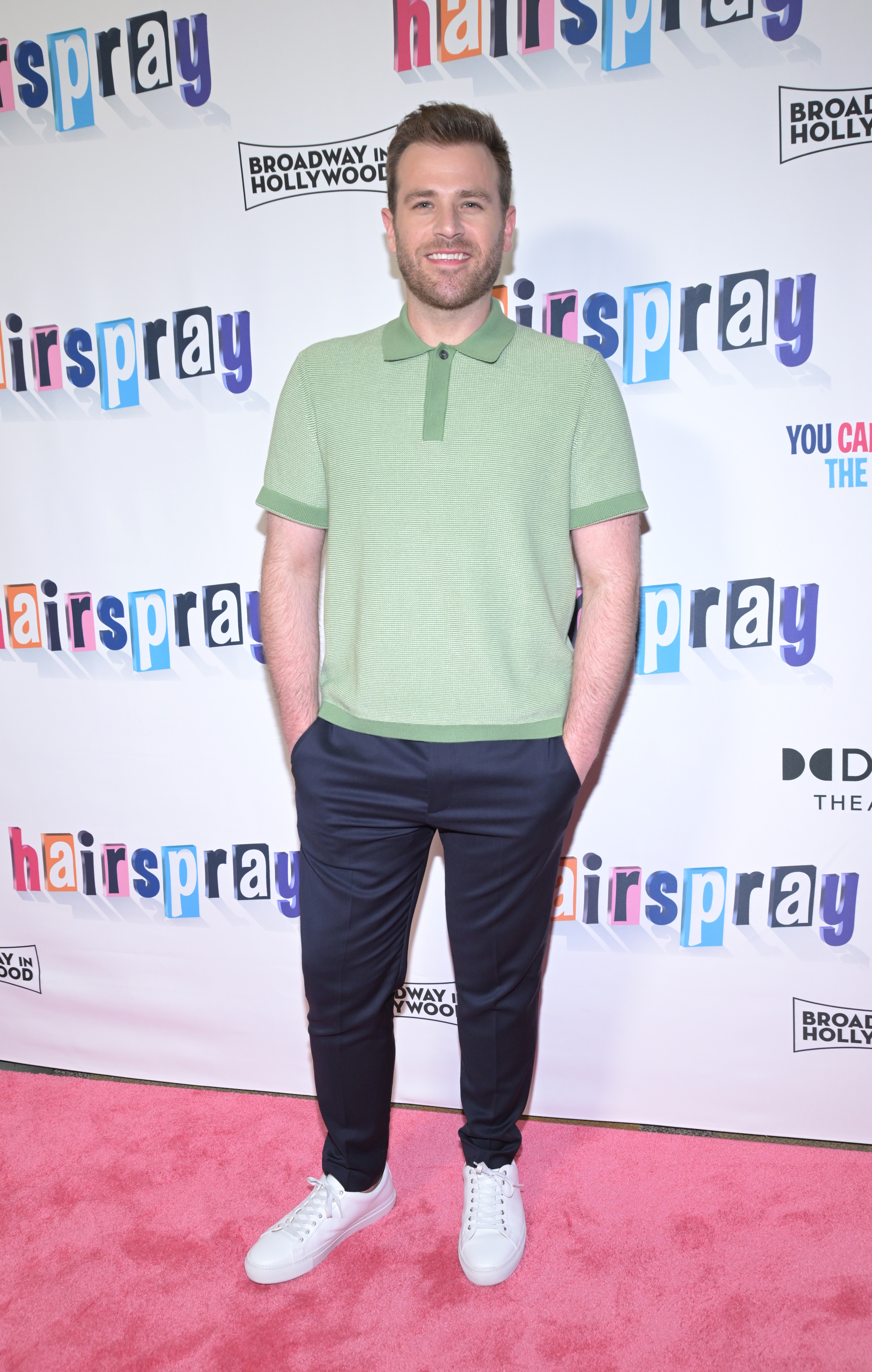Scott Evans on the red carpet at an event for the hairspray