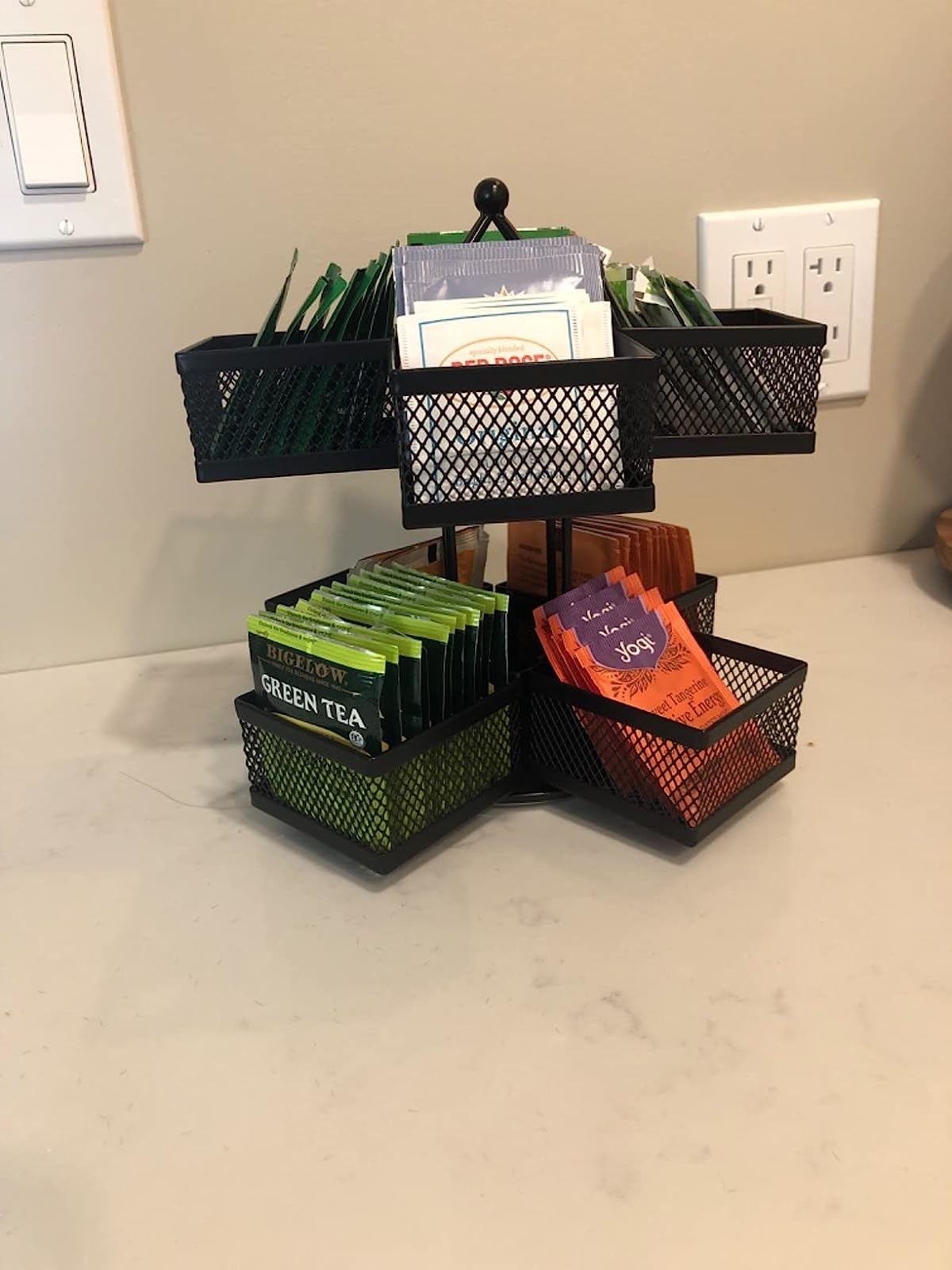 the carousel on reviewer's counter holding tea bags