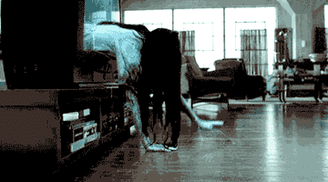 Samara from &quot;The Ring&quot; crawling out of a TV