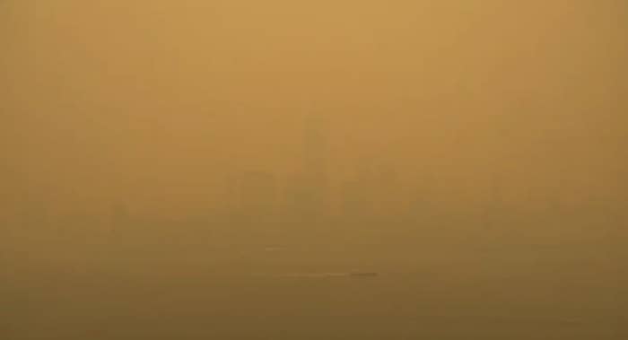 A yellow-orange haze enveloping New York