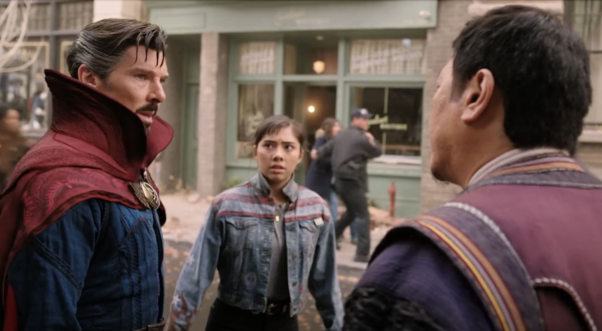 Dr. Strange, America, and Wong on the streets of NYC