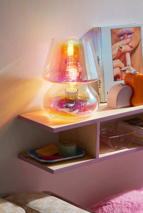 the iridescent table lamp on shelves
