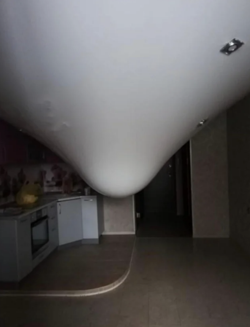 A massive water bubble in the ceiling