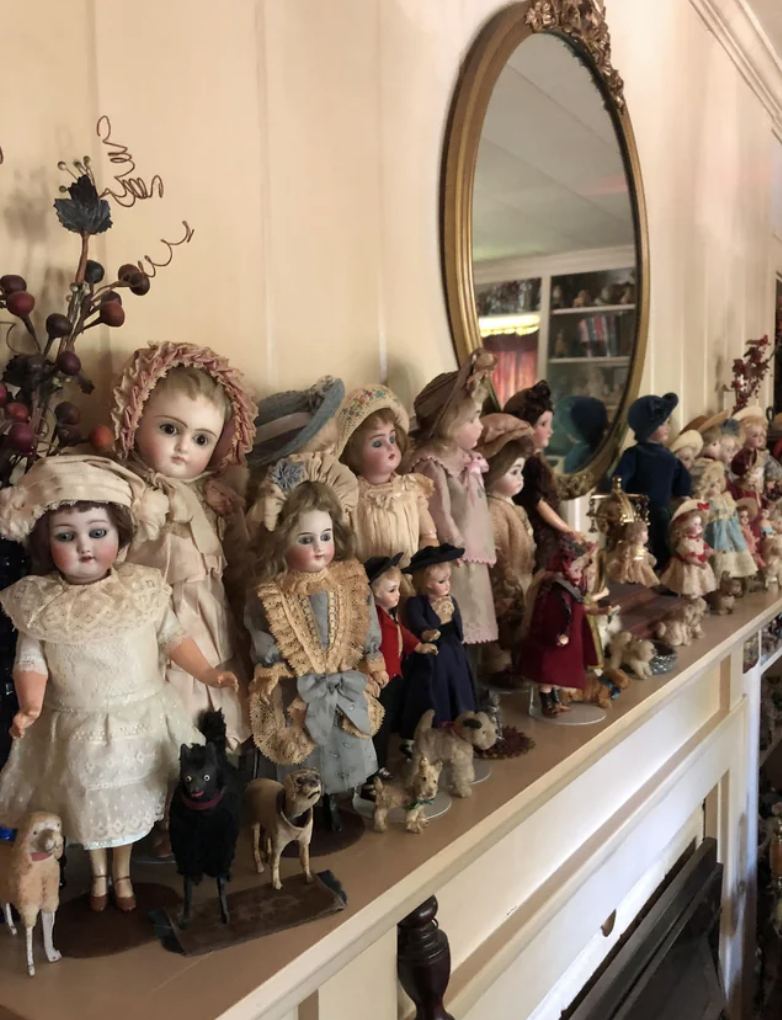 Dolls on a mantle