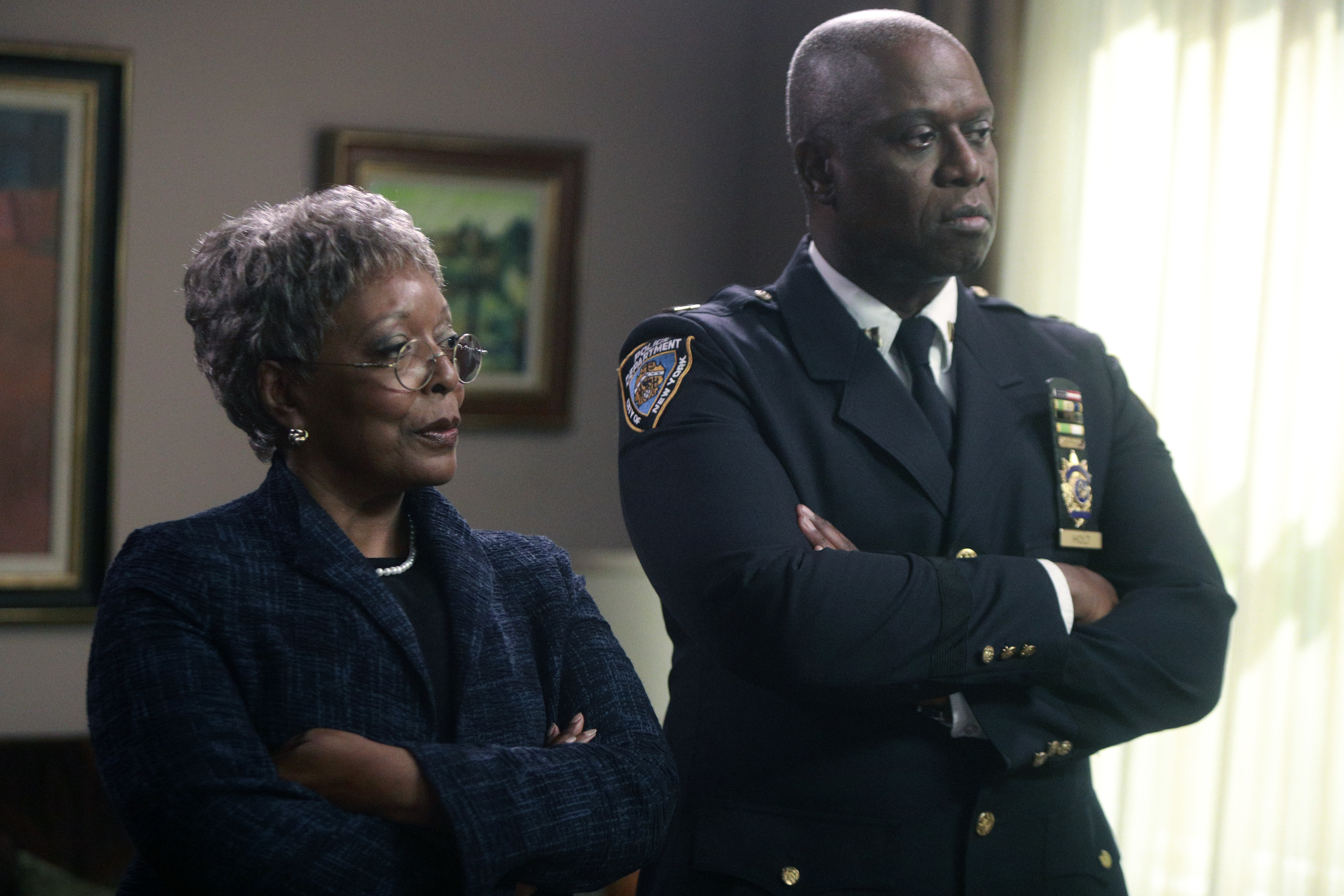 L. Scott Caldwell and Andre Braugher cross their arms in disapproval