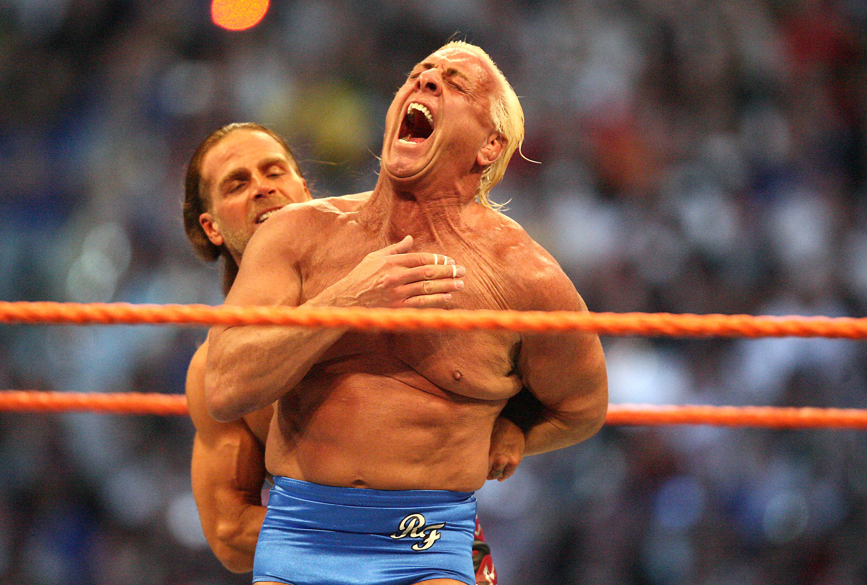Ric Flair (front) and Shawn Michaels wrestle in the Career Threatening Match at WrestleMania XXIV at the Citrus Bowl on Sunday, March 30, 2008