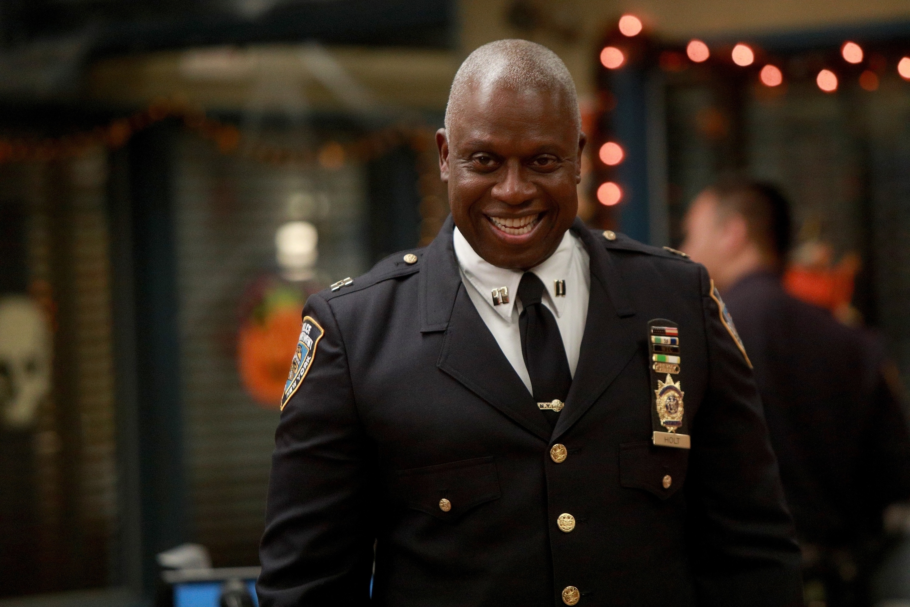 Andre Braugher gives off a mischievous grin