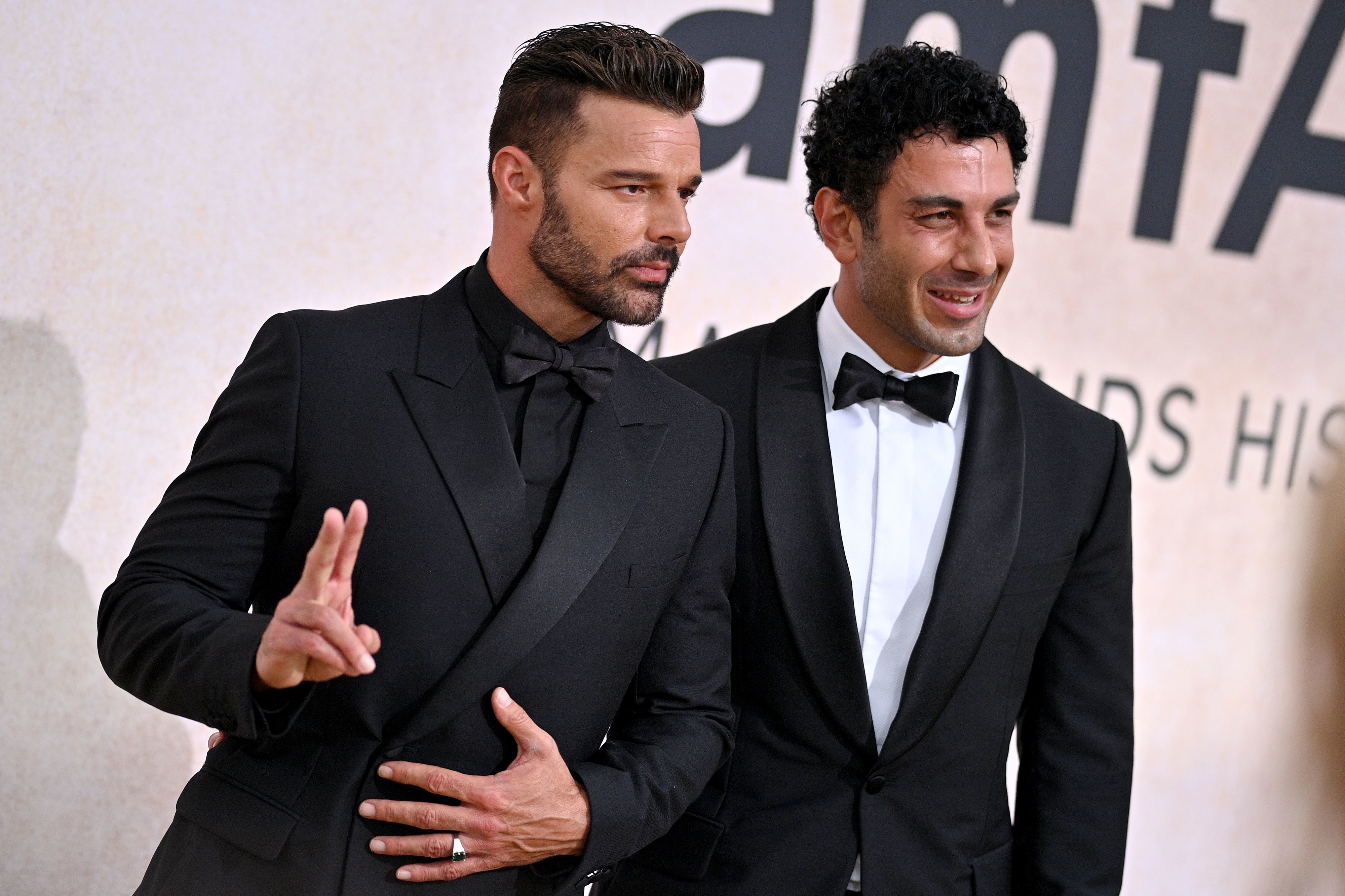 Close-up of Ricky and Jwan wearing tuxes