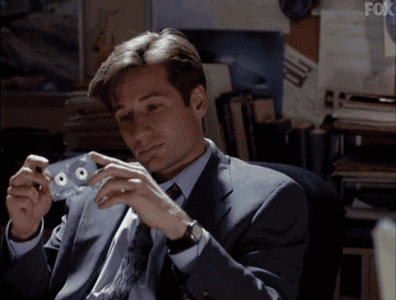 mulder holding a cassette tape on x files
