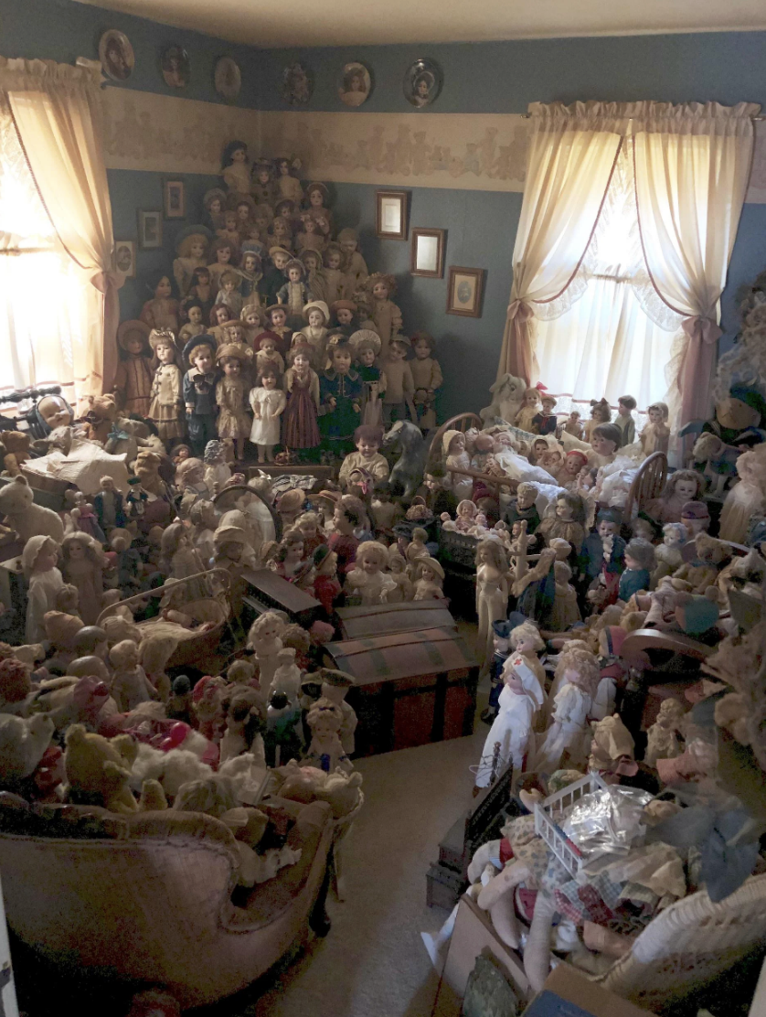 A room full of antique dolls