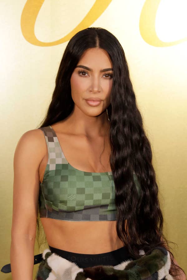 Kim Kardashian attends the Louis Vuitton Menswear Spring/Summer 2024 show as part of Paris Fashion Week