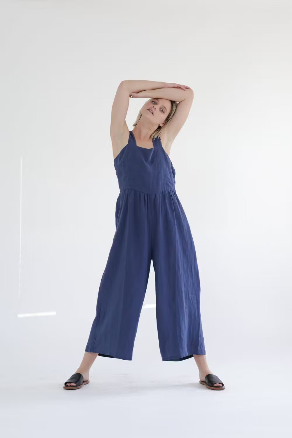 a. model in the blue jumpsuit