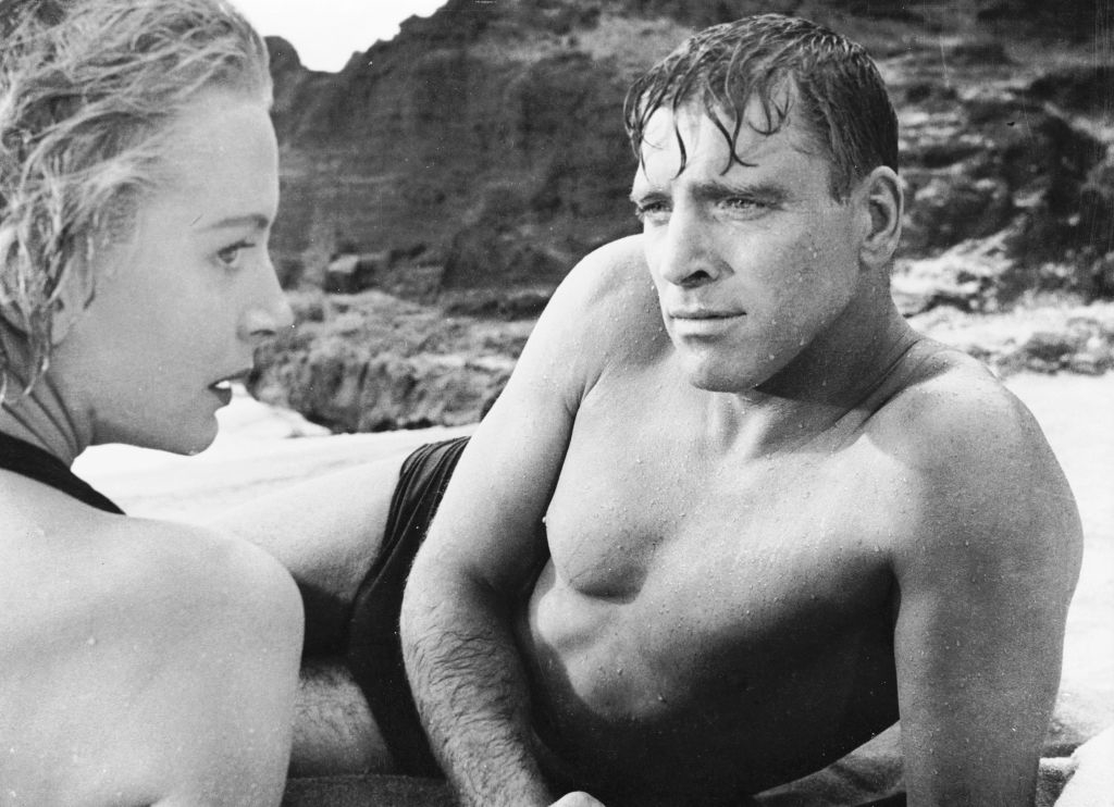 Burt Lancaster and Deborah Kerr get passionate on a beach in the classic love scene from Fred Zinnemann&#x27;s &#x27;From Here to Eternity&#x27;