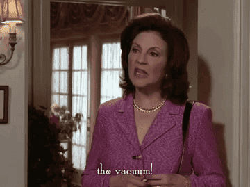 a GIF of Emily Gilmore from Gilmore Girls saying &quot;the vacuum&quot;