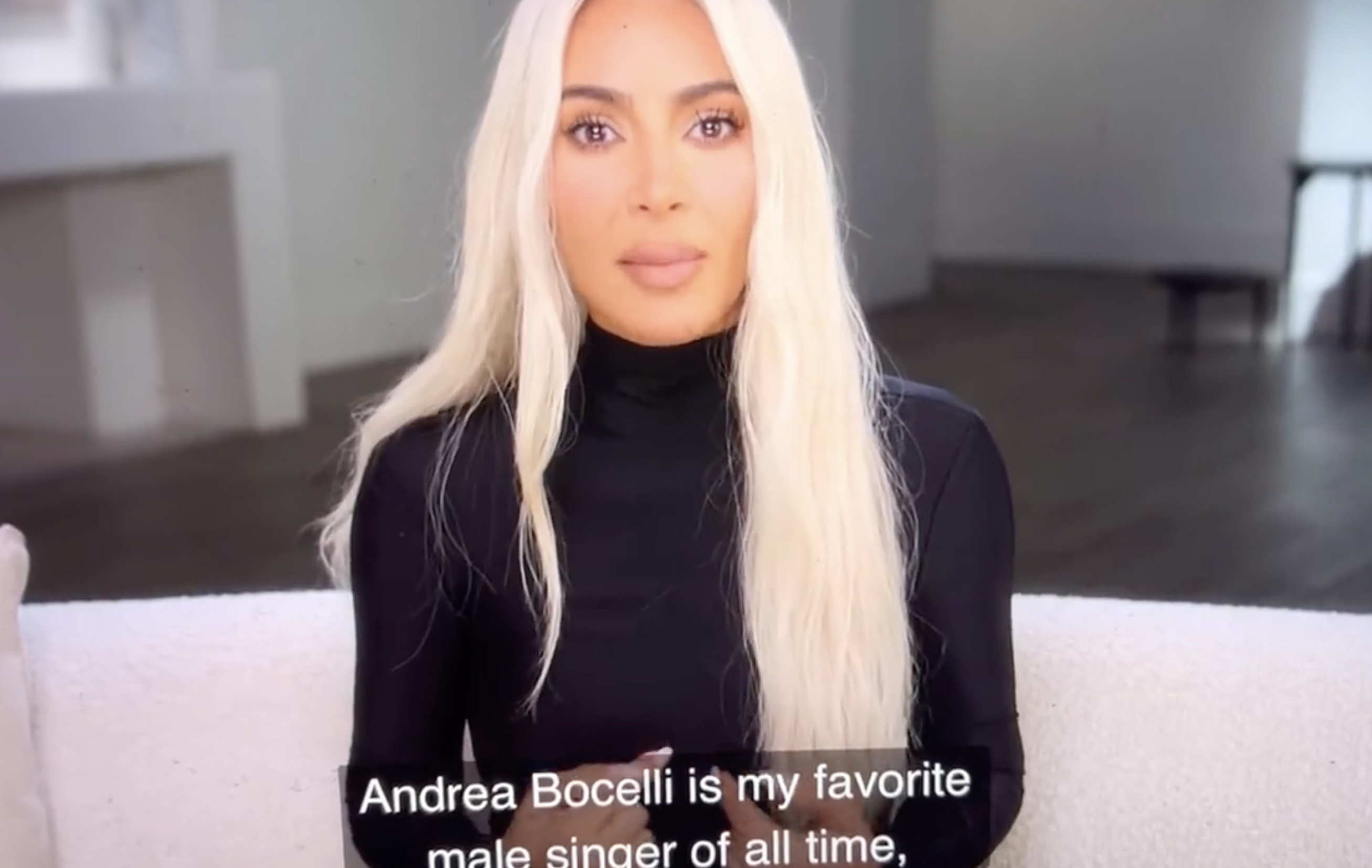 Close-up of Kim with long, platinum blonde hair with caption, &quot;Andrea Bocelli is my favorite make singer of all time&quot;
