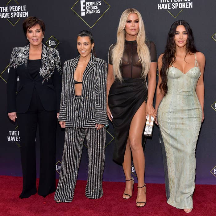 Kris Jenner with Kourtney, Khloé, and Kim Kardashian on the red carpet