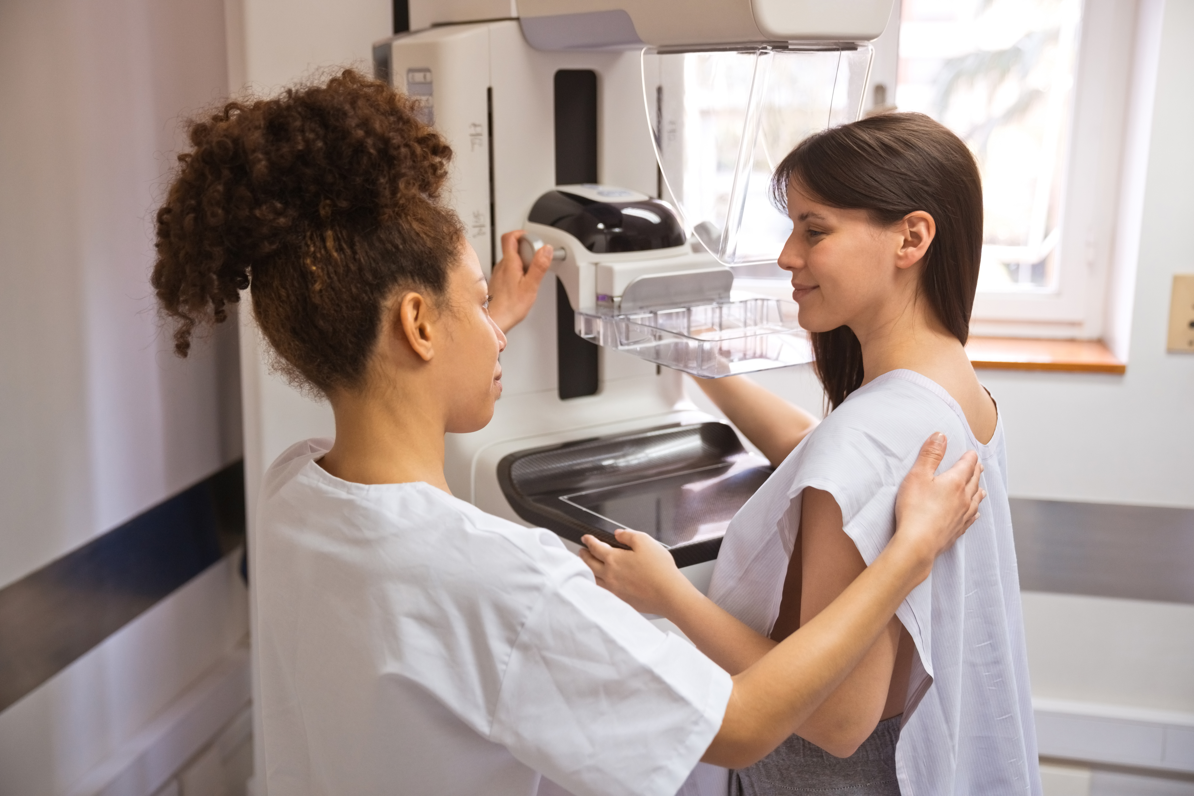 A woman having a mammogram