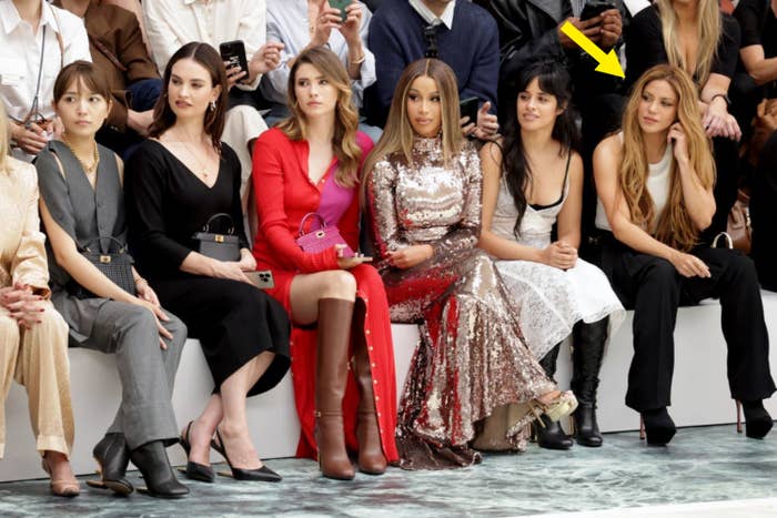 Shakira sitting front row with other celebrities