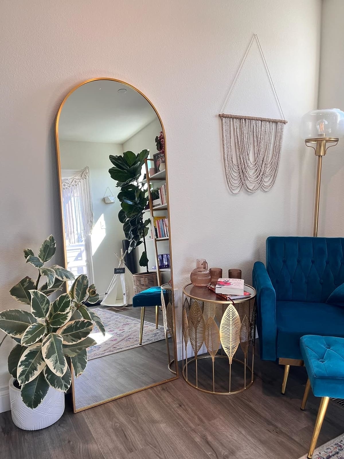 Reviewer image of the brass-frame mirror in their home