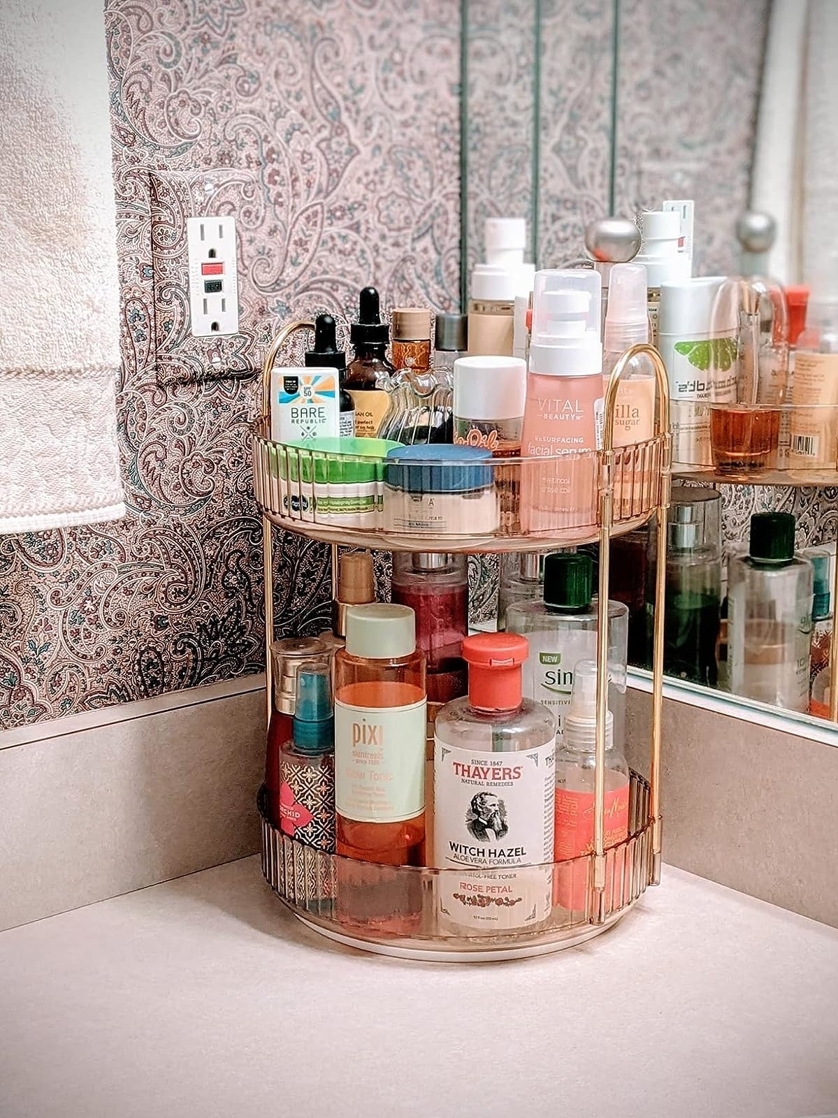 Reviewer image of toiletries in the two-tier organizer