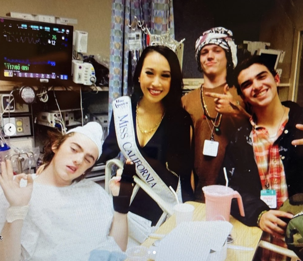 Angus in the hospital with friends and Miss California