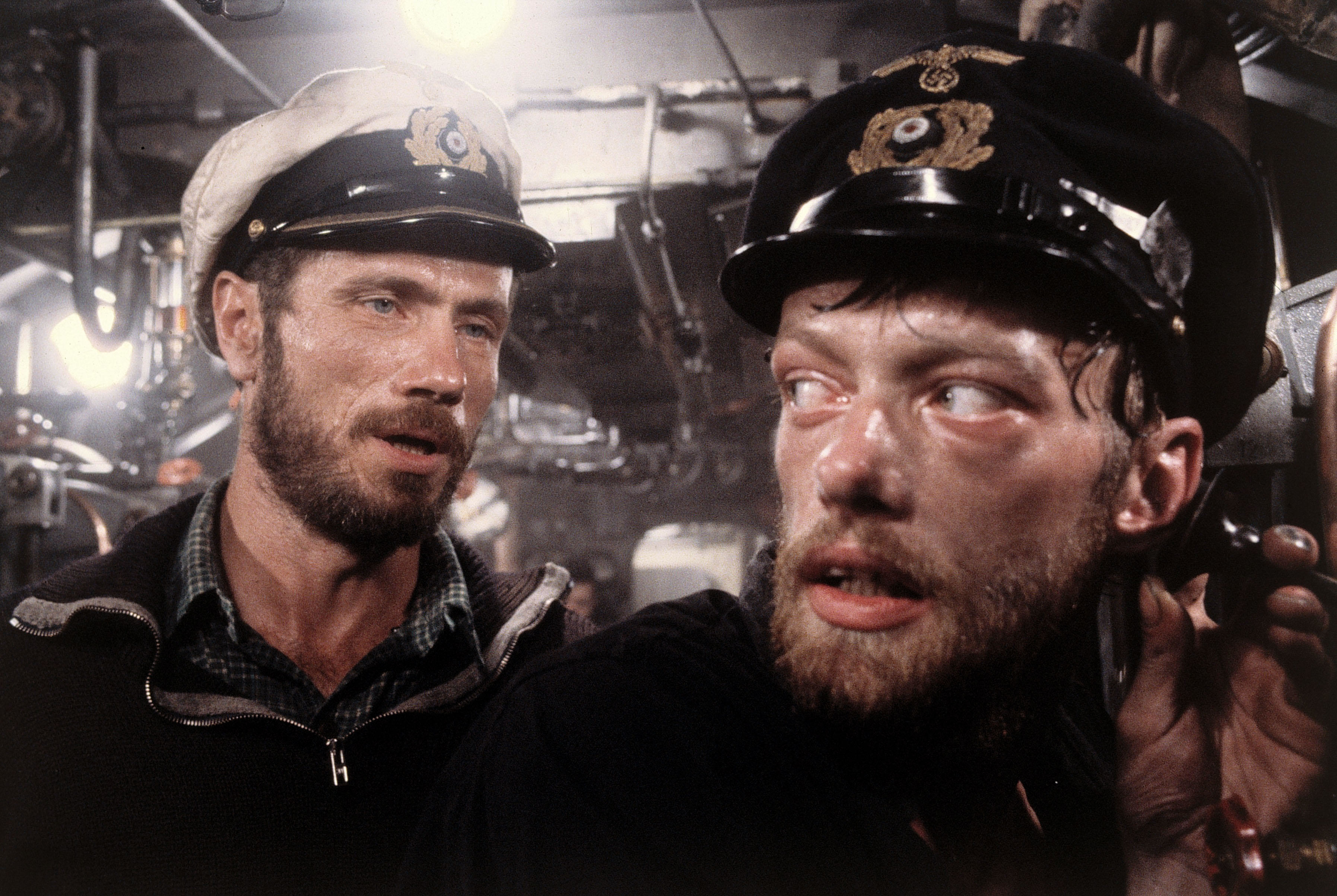 Jurgen Prochnow and Erwin Leder stand in a tense, muggy submarine boiler room