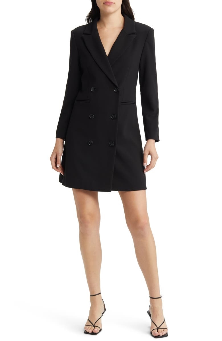 model in black long sleeve double breasted blazer mini dress