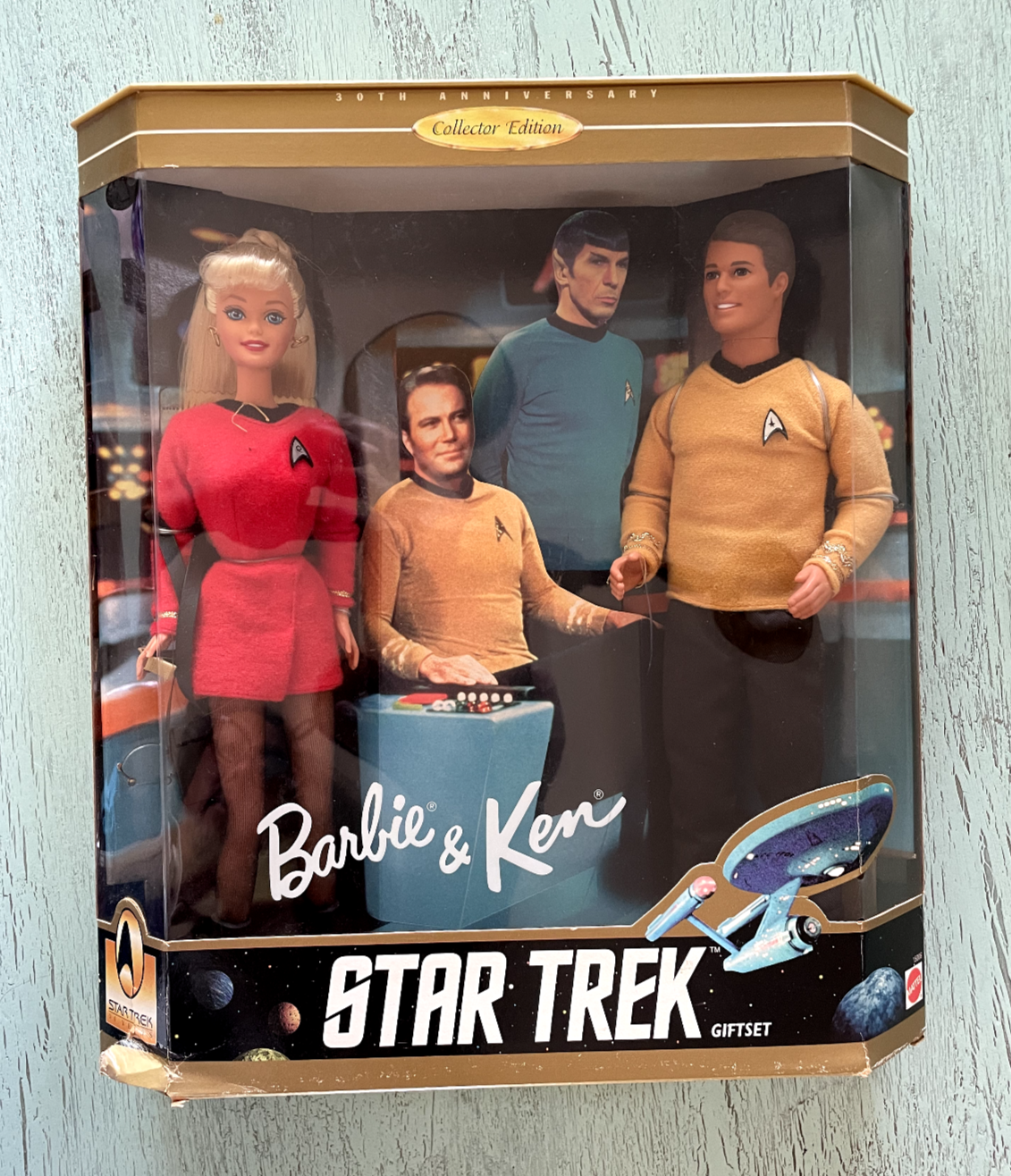 barbie in the box with cardboard characters from star trek