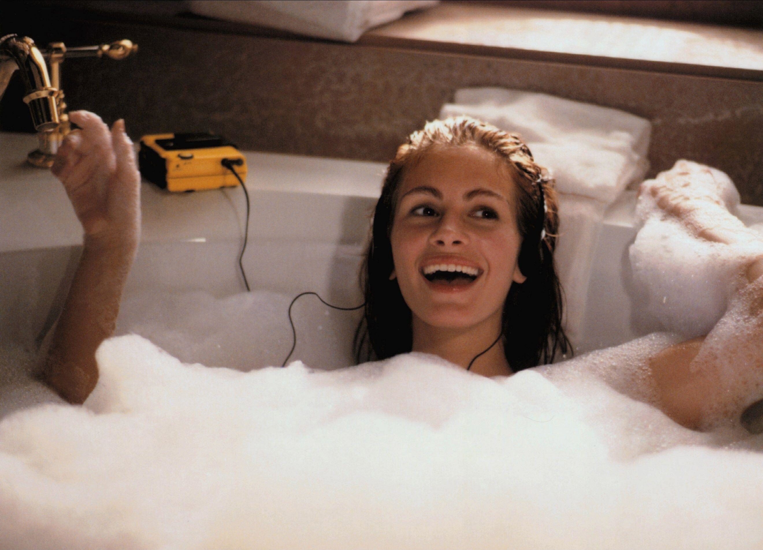 Julia Roberts in a bubble bath signing
