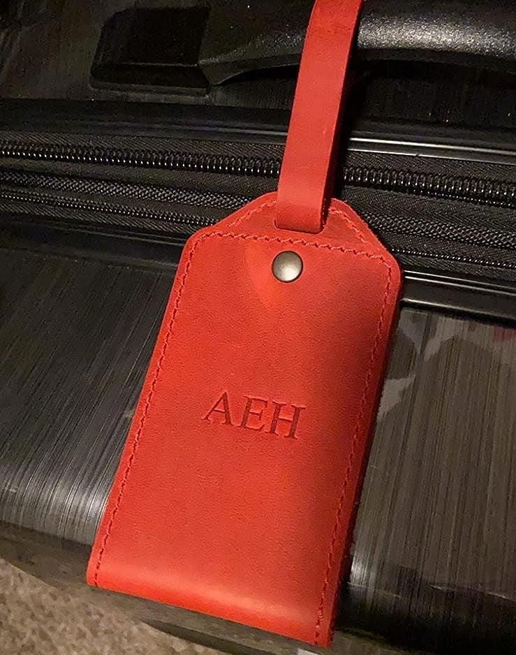 reviewer&#x27;s red luggage tag