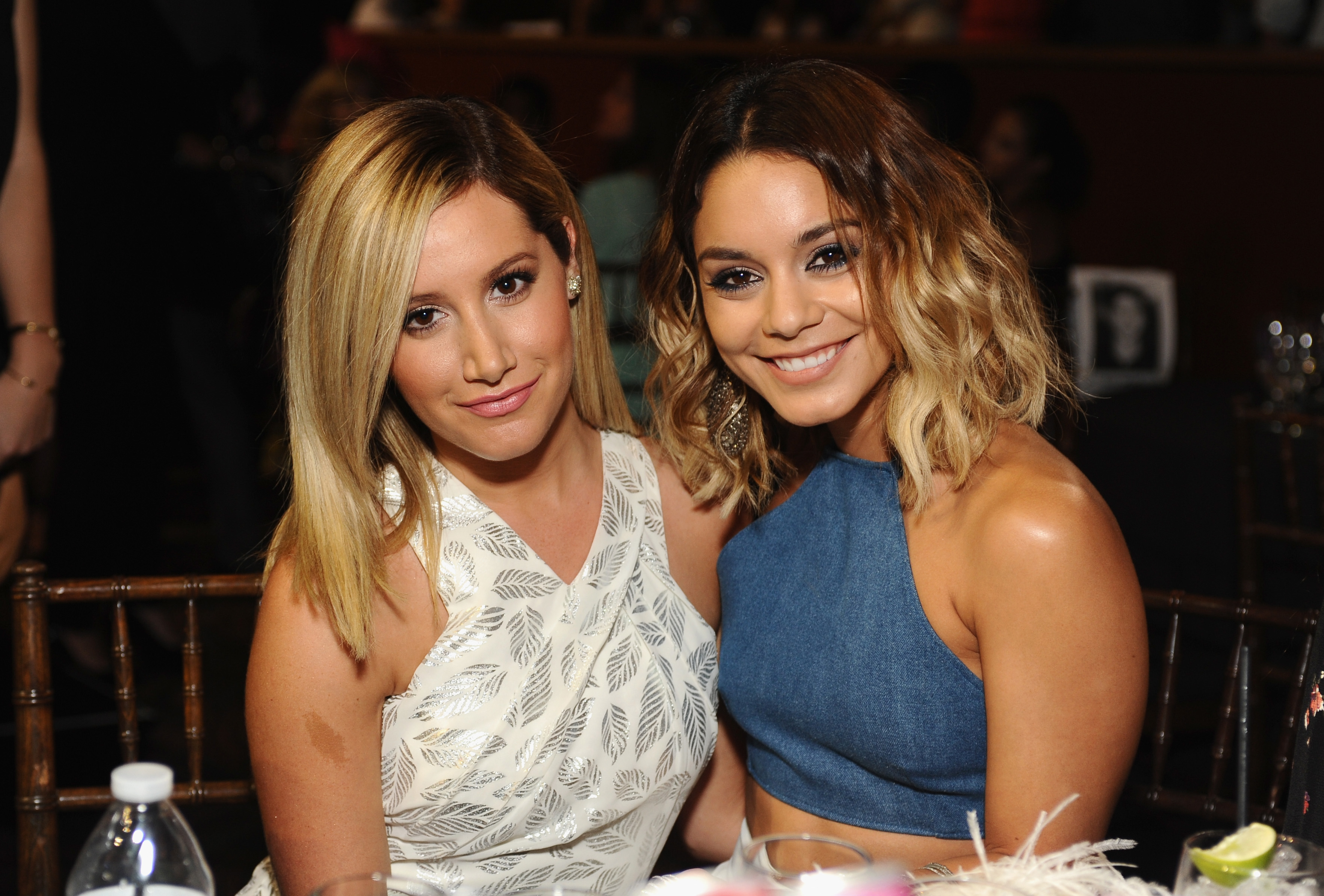 Close-up of Ashley and Vanessa smiling at a media event
