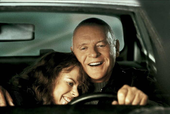 Nicole Kidman and Anthony Hopkins smiling in a car