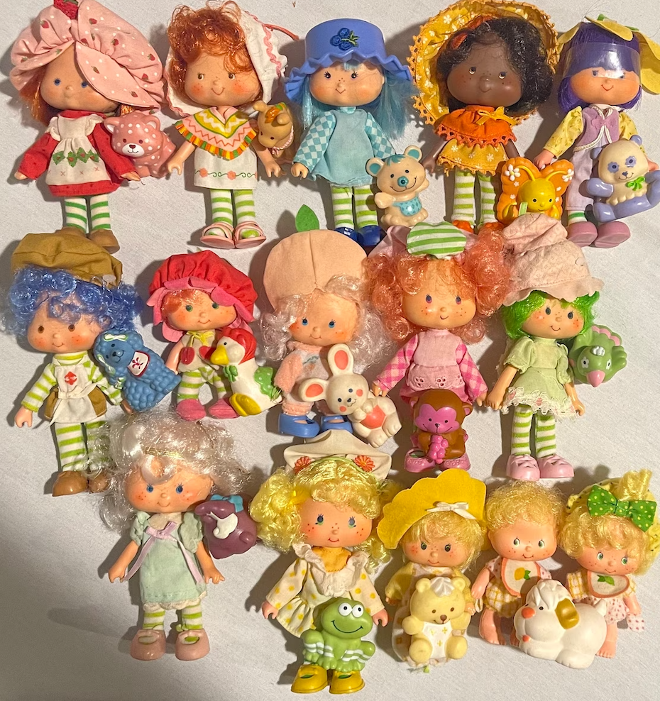 a bunch of the dolls laid out