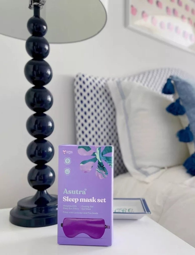 the cooling eye mask package on a nightstand
