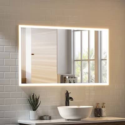 The LED lighted framed bathroom vanity mirror with adjustable brightness and bluetooth.