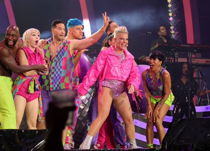 pink on stage with her dancers