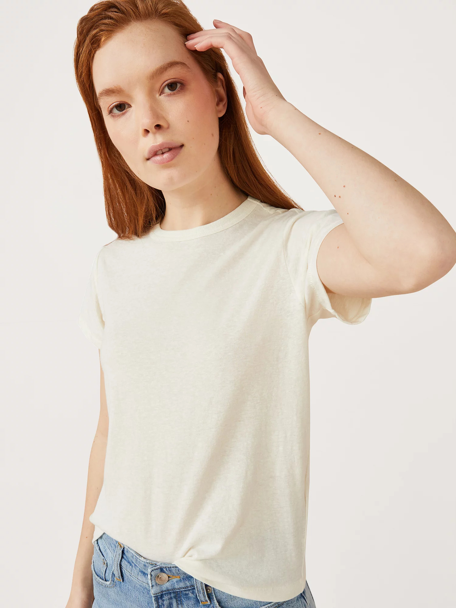 Model wearing the claw white shirt
