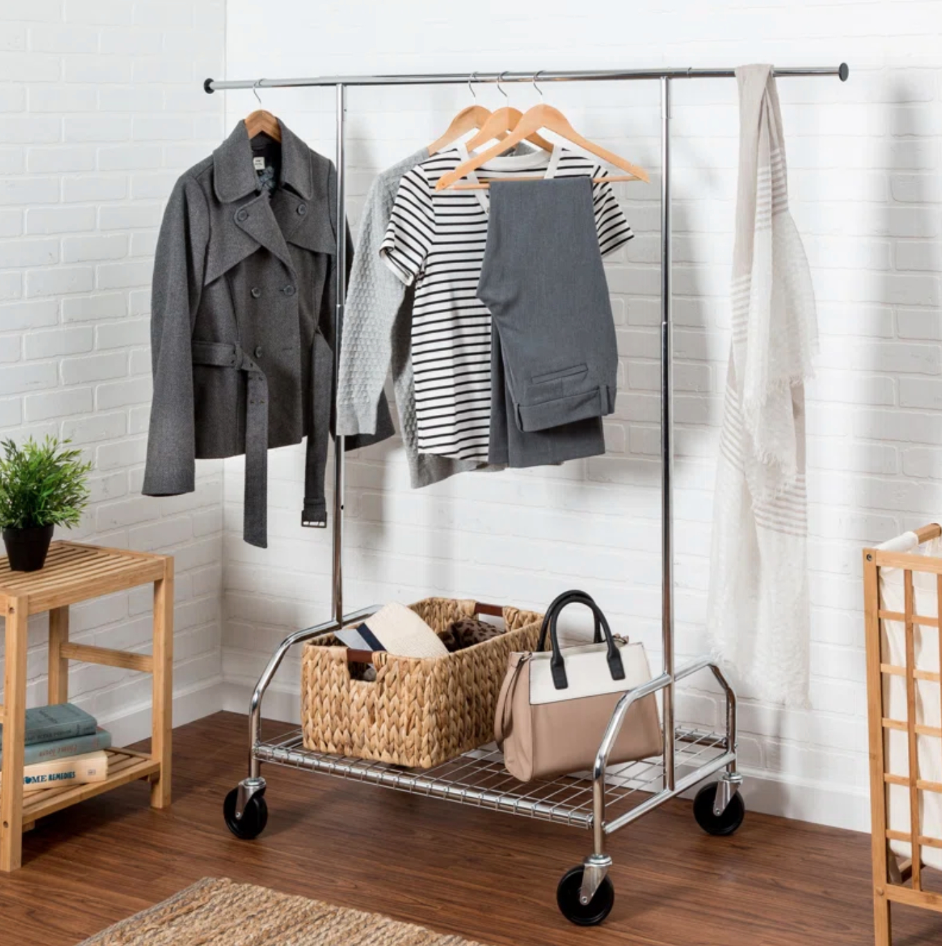 a steel garment rack with clothes hanging