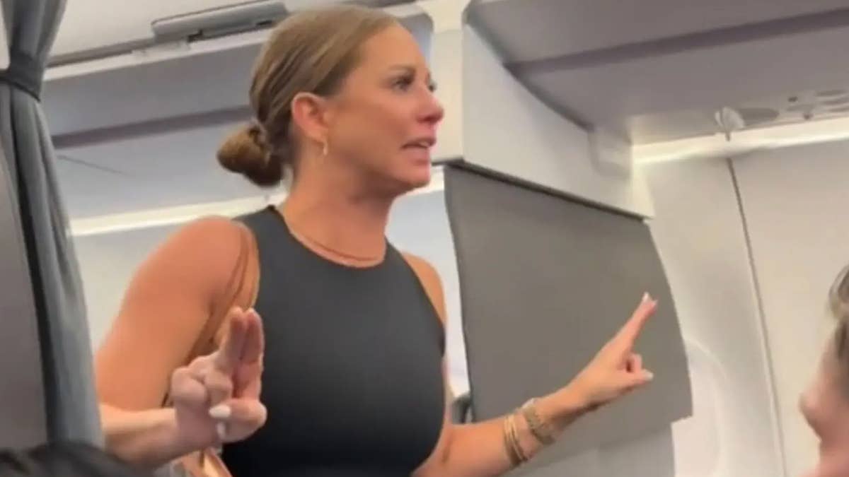 Video Shows Woman's Full 'Not Real' Airplane Outburst: 'Stop the F*cking Plane' (UPDATE)