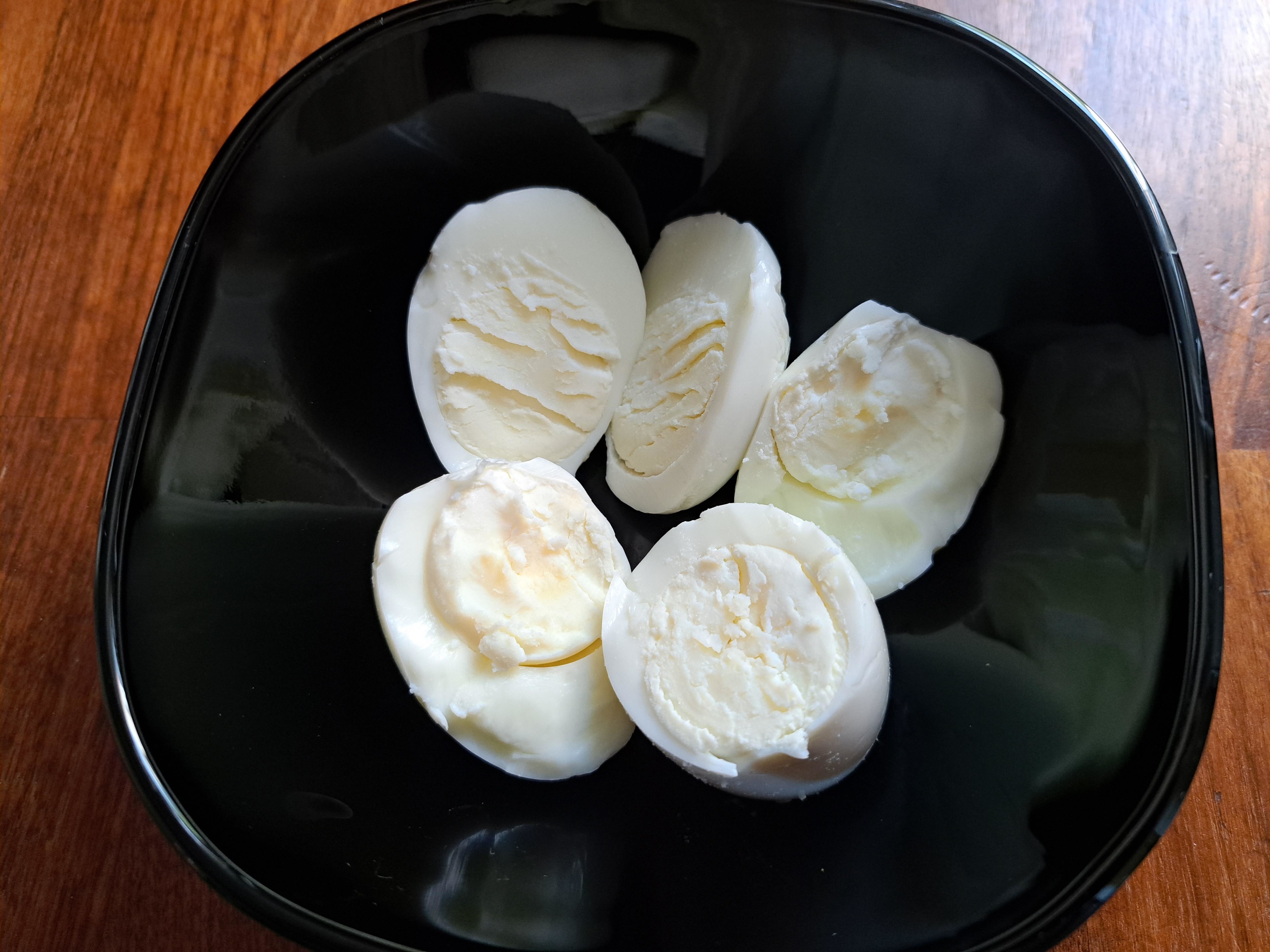 Sliced hard-boiled eggs  with white yolks