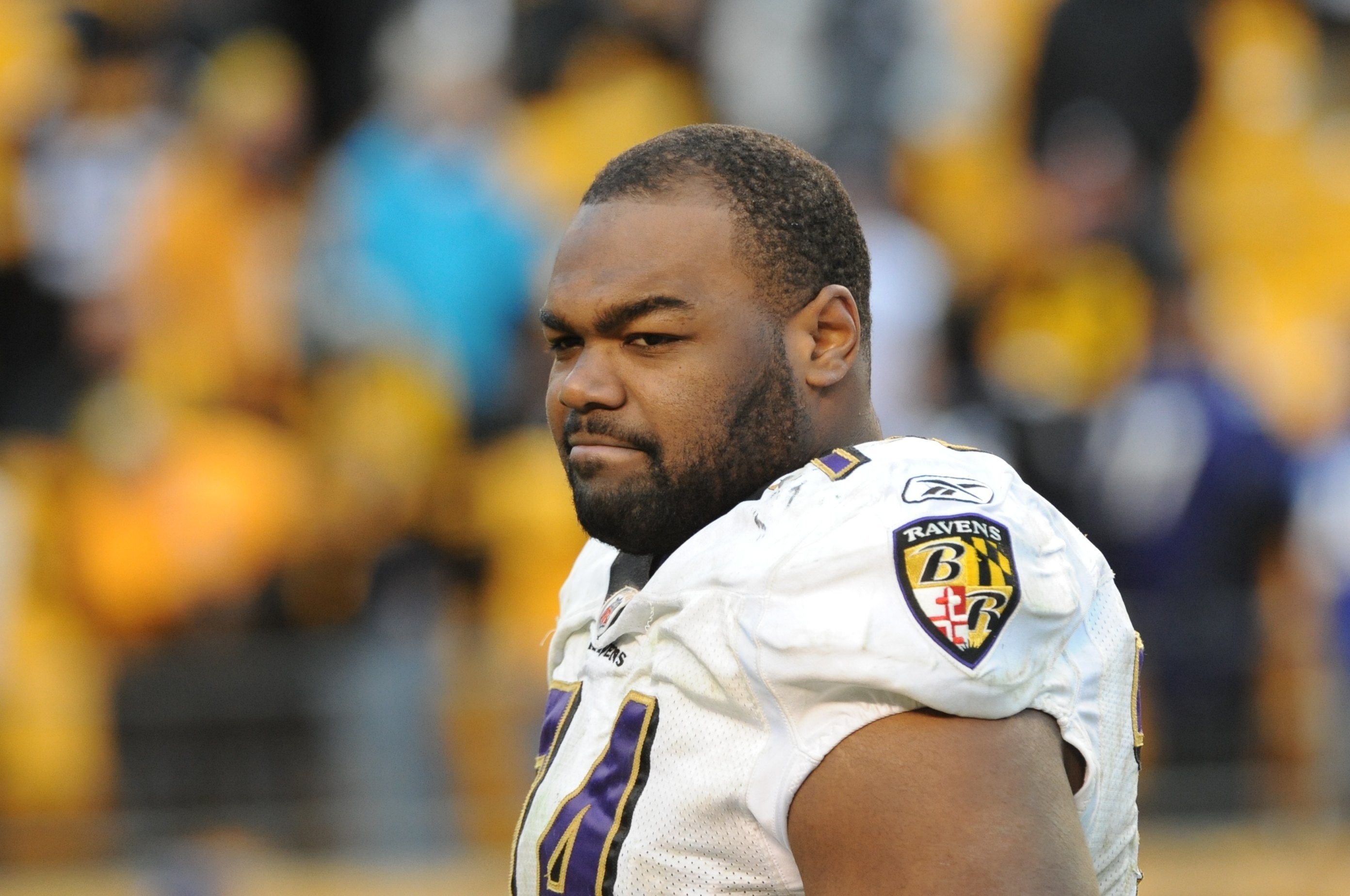 Closeup of Michael Oher on the football field