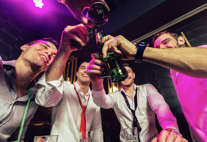 group of men at a bar