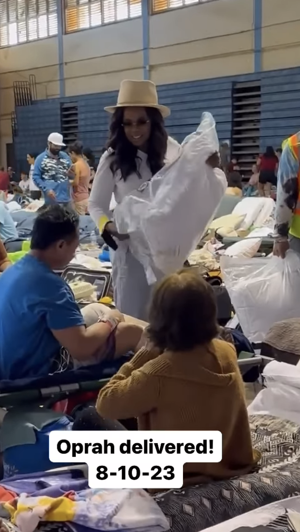 Oprah handing out supplies at a shelter